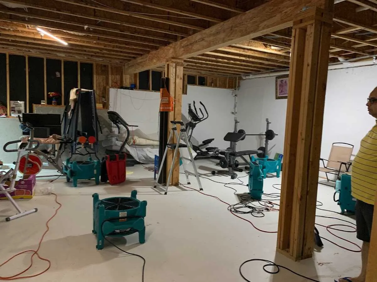 Basement drying equipment setup for Contents Cleaning & Restoration in North Syracuse