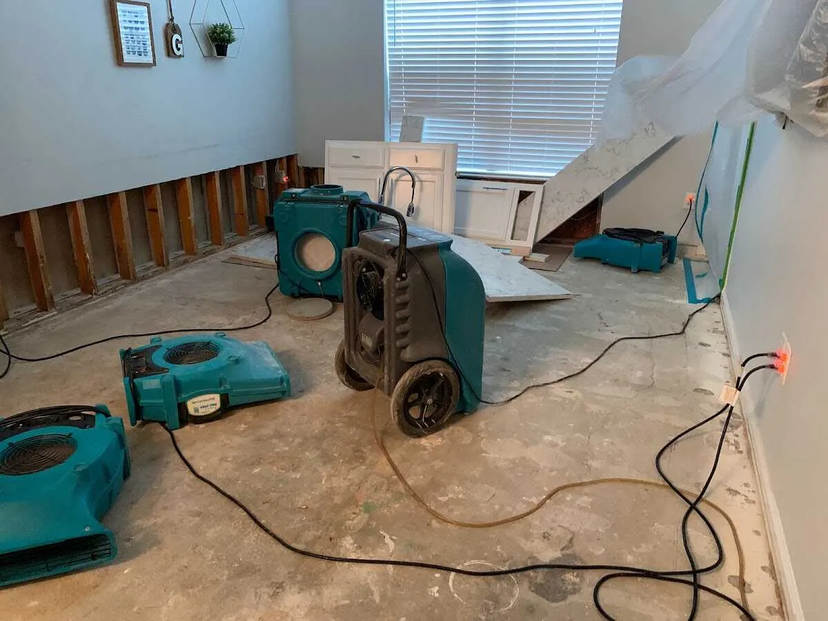 Dehumidifier in flood-cut room for Water Damage Restoration in North Syracuse
